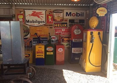 Petrol bowsers and signs, highboys shell mobil ampol